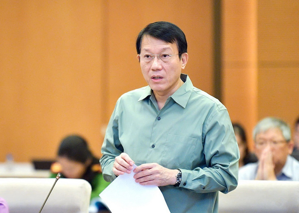 Bộ trưởng Bộ Công an Lương Tam Quang trình bày tóm tắt tờ trình. (Ảnh: Doãn Tấn/ TTXVN)