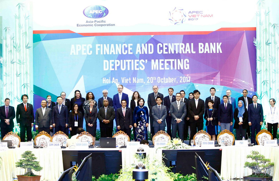 Các đại biểu dự hội nghị chụp ảnh chung. (Ảnh: An Đăng/TTXVN)