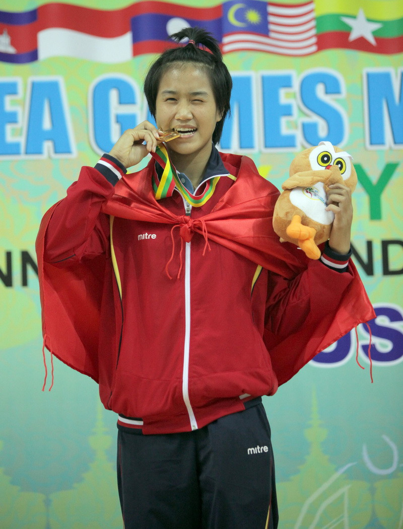 Vận động viên Nguyễn Hoài Thu giành huy chương vàng hạng cân 52kg nữ nội dung đối kháng. (Ảnh: Quang Nhựt/TTXVN)