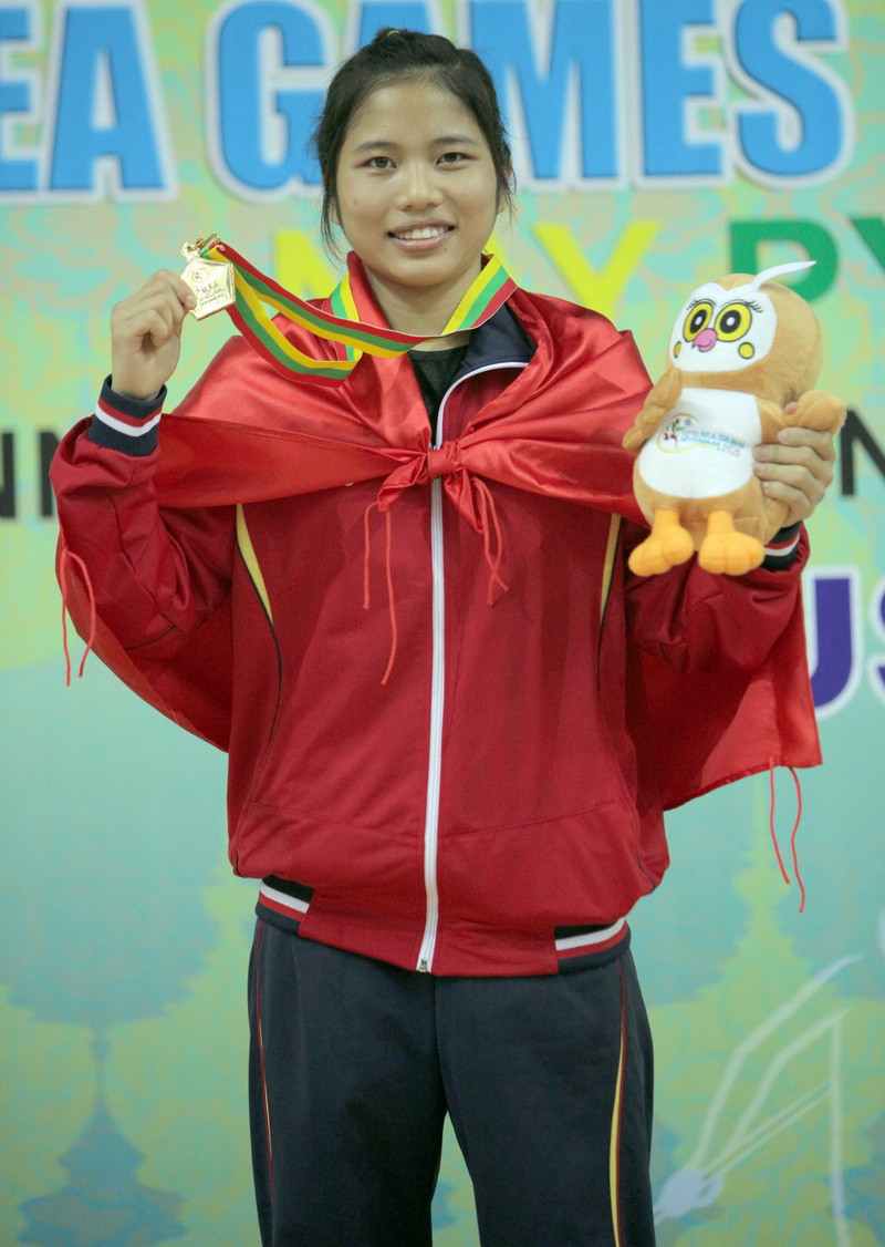 Vận động viên Nguyễn Thị Chinh giành huy chương vàng hạng cân 48kg nữ nội dung đối kháng. (Ảnh: Quang Nhựt/TTXVN)