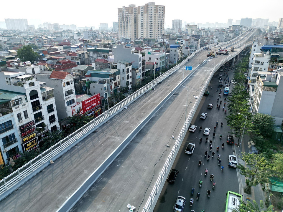 Khi dự án hoàn thành và đi vào vận hành sẽ giúp thay đổi bộ mặt tuyến Vành đai 2 tại khu vực này, giảm ùn tắc giao thông cho đường Trường Chinh, Đại La, Minh Khai... góp phần hoàn thiện quy hoạch giao thông của Hà Nội. (Ảnh: Tuấn Anh/TTXVN)