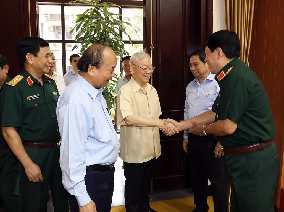 Tổng Bí thư Nguyễn Phú Trọng, Chủ tịch nước Nguyễn Xuân Phúc, Thủ tướng Phạm Minh Chính với đại biểu dự hội nghị. (Ảnh: Trí Dũng/TTXVN)