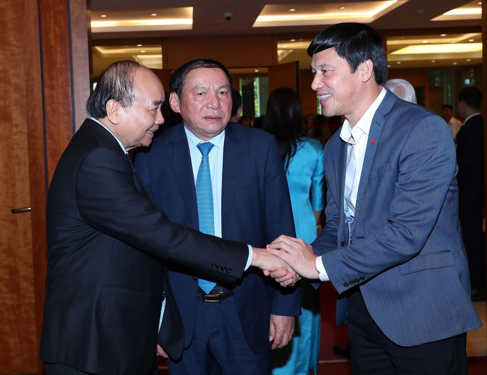 Chủ tịch nước Nguyễn Xuân Phúc và các đại biểu Quốc hội. (Ảnh: TTXVN)