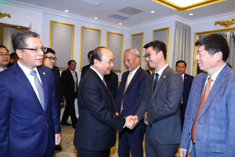 Thủ tướng Nguyễn Xuân Phúc tiếp lãnh đạo các doanh nghiệp hàng đầu trong lĩnh vực cơ sở hạ tầng của Trung Quốc. (Ảnh: Thống Nhất/TTXVN)