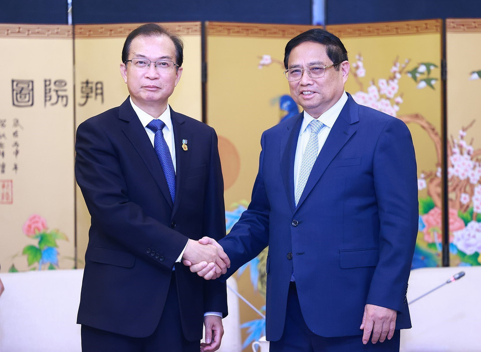 Thủ tướng Phạm Minh Chính tiếp ông Jiang Yi, Chủ tịch Tập đoàn Huadian, Trung Quốc. (Ảnh: Dương Giang/TTXVN)