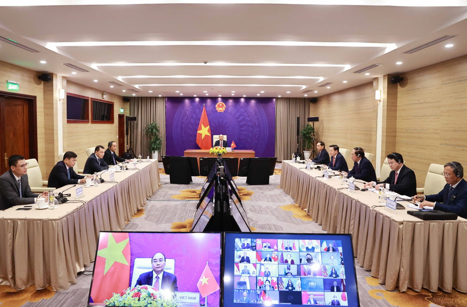 Chủ tịch nước Nguyễn Xuân Phúc và đoàn đại biểu Việt Nam tại điểm cầu Hà Nội. (Ảnh: Thống Nhất/TTXVN)