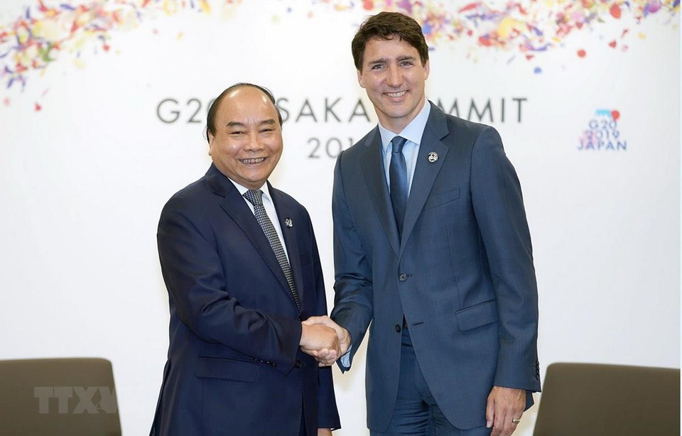 Thủ tướng Nguyễn Xuân Phúc gặp Thủ tướng Canada Justin Trudeau. (Ảnh: Thống Nhất/TTXVN)