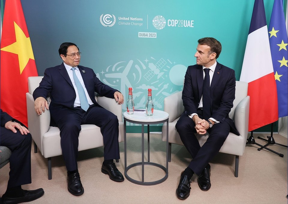 Thủ tướng Phạm Minh Chính gặp Tổng thống Pháp Emmanuel Macron. (Ảnh: Dương Giang/TTXVN)