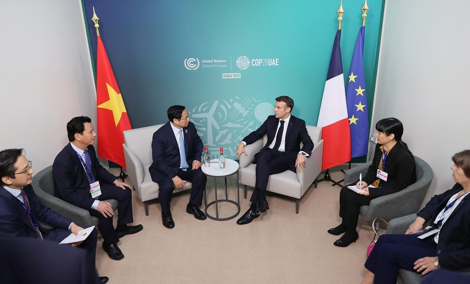 Thủ tướng Phạm Minh Chính gặp Tổng thống Pháp Emmanuel Macron. (Ảnh: Dương Giang/TTXVN)