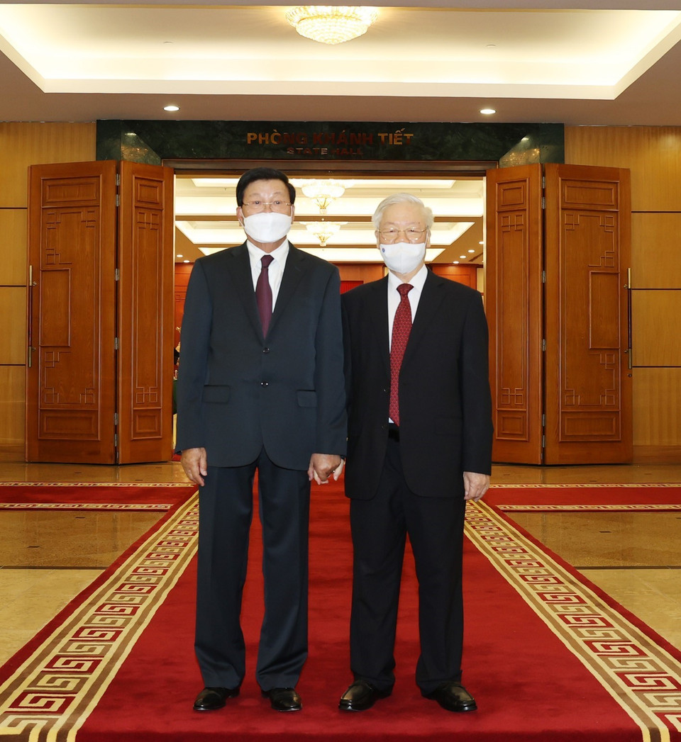 Tổng Bí thư Nguyễn Phú Trọng đón Tổng Bí thư, Chủ tịch nước Lào Thongloun Sisoulith. (Ảnh: Trí Dũng/TTXVN)