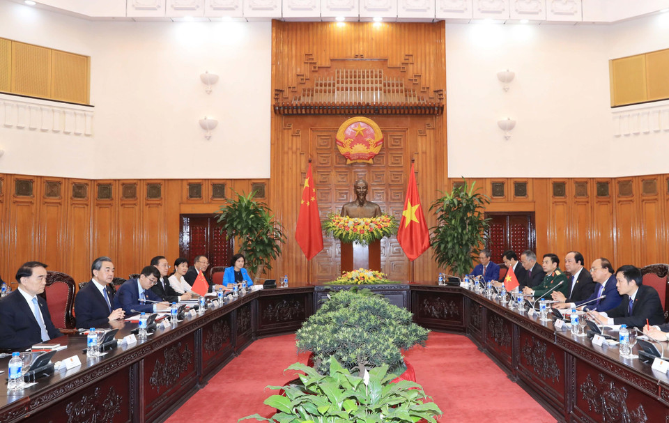 Thủ tướng Nguyễn Xuân Phúc tiếp Ủy viên Quốc vụ, Bộ trưởng Ngoại giao Trung Quốc Vương Nghị. (Ảnh: Thống Nhất/TTXVN)