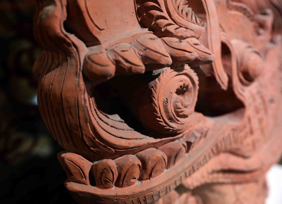 Đầu rồng thời Trần, niên đại thế kỷ 18. (Ảnh: Thanh Tùng/TTXVN)