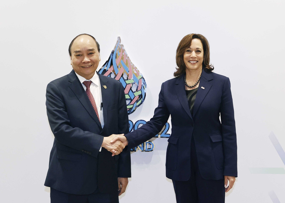 Chủ tịch nước Nguyễn Xuân Phúc và Phó Tổng thống Hoa Kỳ Kamala Harris. (Ảnh: Thống Nhất/TTXVN)