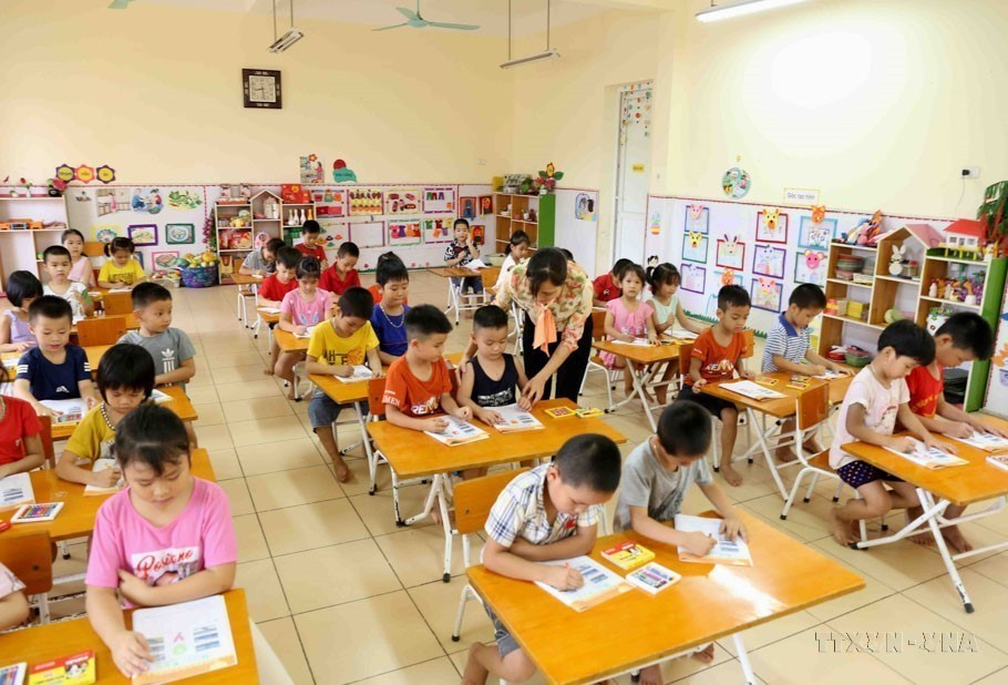 Giờ học của trẻ lớp 5 tuổi Trường Mầm non Ba Trại A, xã Ba Trại, huyện Ba Vì được đầu tư xây dựng khang trang theo tiêu chí nông thôn mới. (Ảnh: Vũ Sinh/TTXVN)