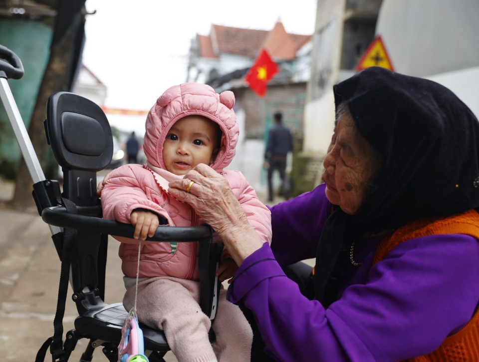 Niềm vui của người dân xã Minh Châu khi Tết đến, Xuân về. (Ảnh: Minh Quyết/TTXVN)