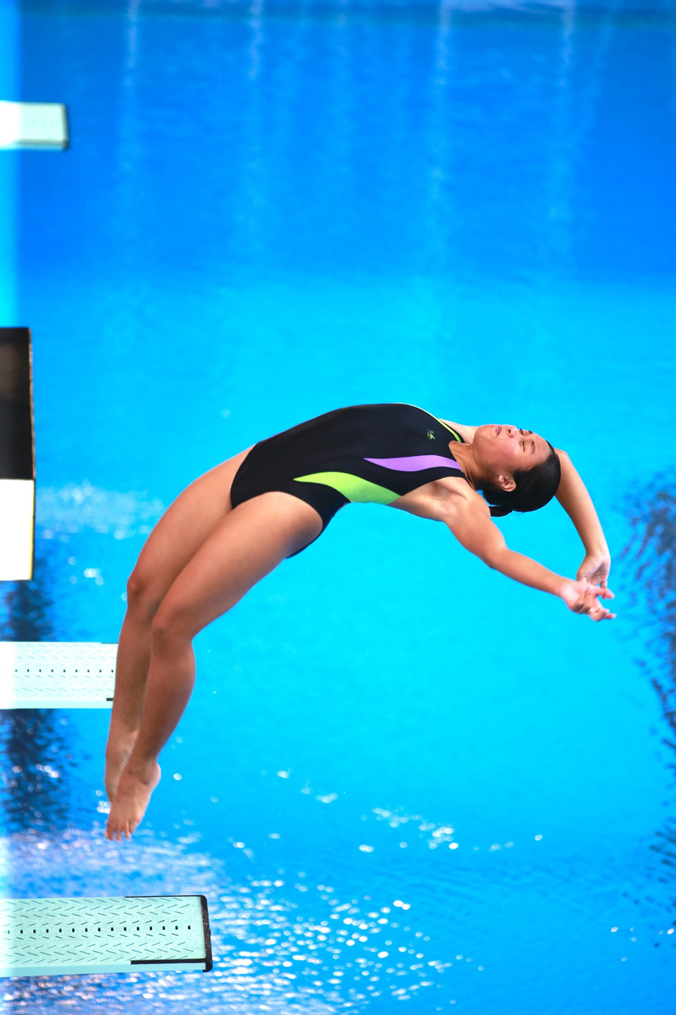 Bài thi đấu của vận động viên Việt Nam Mai Hồng Hạnh ở nội dung 3m cầu mềm nữ. (Ảnh: Trọng Đạt/TTXVN)