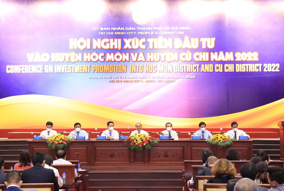 Chủ tịch nước Nguyễn Xuân Phúc dự Hội nghị xúc tiến đầu tư vào hai huyện Hóc Môn và Củ Chi năm 2022. (Ảnh: Thống Nhất/TTXVN)