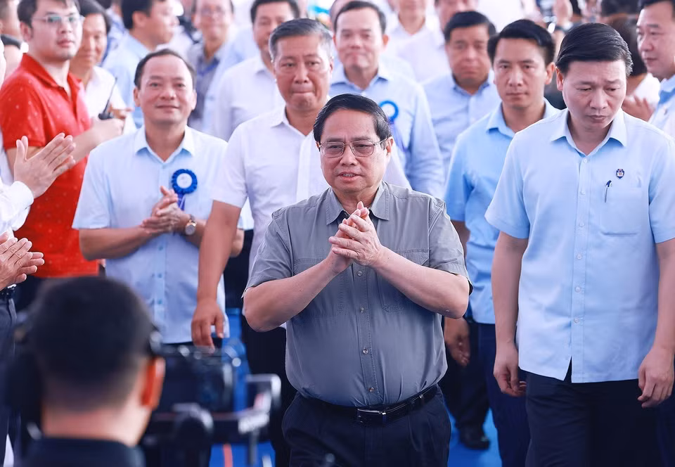 Thủ tướng Phạm Minh Chính đến dự Lễ khánh thành Dự án đường dây 500kV mạch 3 tại điểm cầu Phố Nối (Hưng Yên). (Ảnh: Dương Giang/TTXVN)