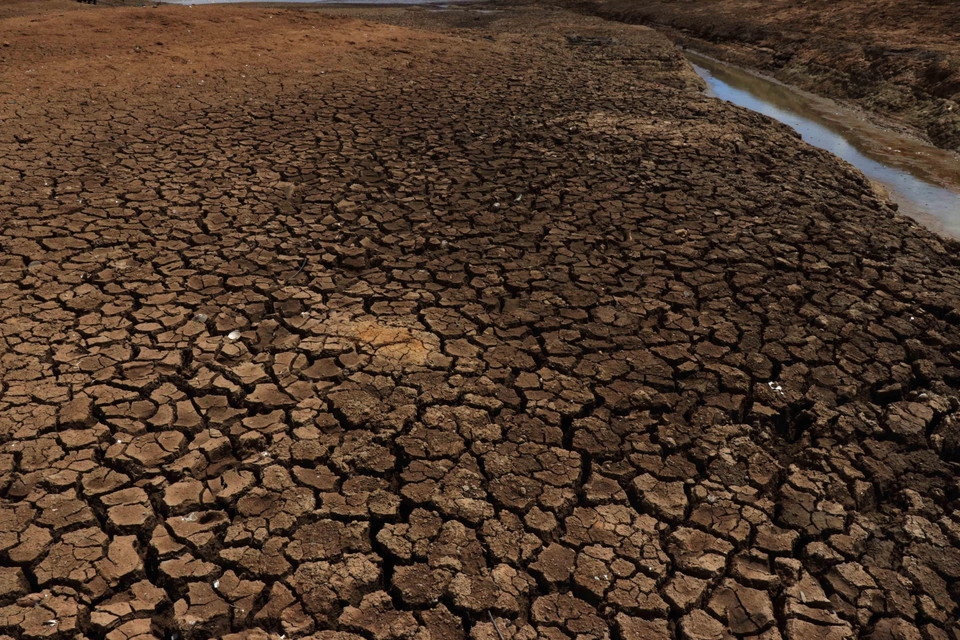 Hồ thủy lợi Ea Kpal bị cạn trơ đáy do hạn hán. (Ảnh: Tuấn Anh/TTXVN)