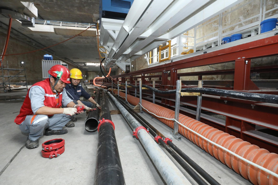 Nhân viên, người lao động làm việc tại Dự án Metro Line 3 Hà Nội. (Ảnh: Anh Tuấn/TTXVN)