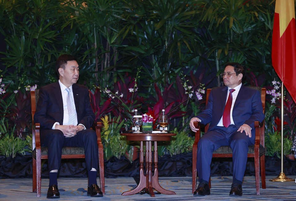 Thủ tướng Phạm Minh Chính tiếp ông Loh Chin Hua, Giám đốc điều hành Tập đoàn Keppel. (Ảnh: Dương Giang/TTXVN)