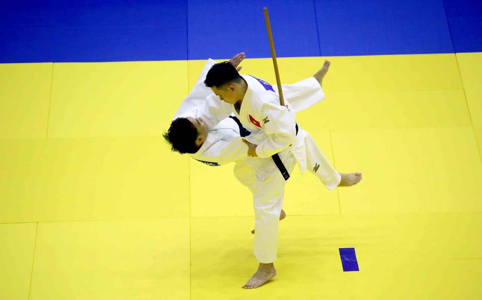 Cặp vận động viên Nguyễn Cường Thịnh-Hà Minh Minh Đức (Việt Nam) thi đấu ở nội dung Kodokan Goshin Jutsu (bài quyền về các kỹ thuật tự vệ hiện đại) đối với nam và đạt 531 điểm để tiến vào vòng chung kết. (Ảnh: Quang Quyết/TTXVN)