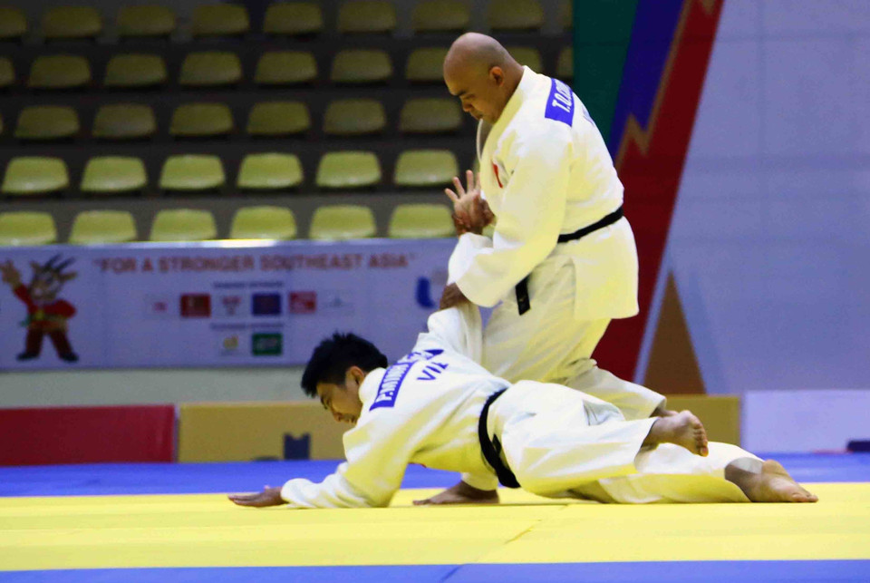 Hình ảnh cặp vận động viên Trần Quốc Cường-Phan Minh Hạnh (Việt Nam) thi đấu ở nội dung Kodokan Goshin Jutsu (bài quyền về các kỹ thuật tự vệ hiện đại) đối với nam và đạt 534.5 điểm để tiến vào vòng chung kết. (Ảnh: Quang Quyết/TTXVN) 