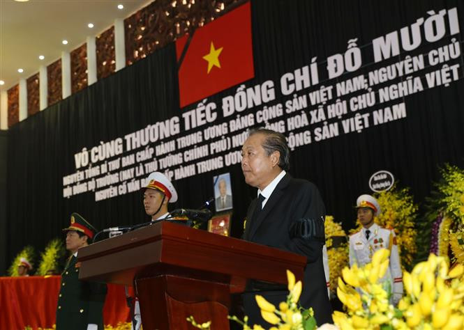 Đồng chí Trương Hòa Bình, Ủy viên Bộ Chính trị, Phó Thủ tướng thường trực Chính phủ, Trưởng Ban Tổ chức Lễ tang, tuyên bố bắt đầu Lễ truy điệu. (Ảnh: Trí Dũng/TTXVN)