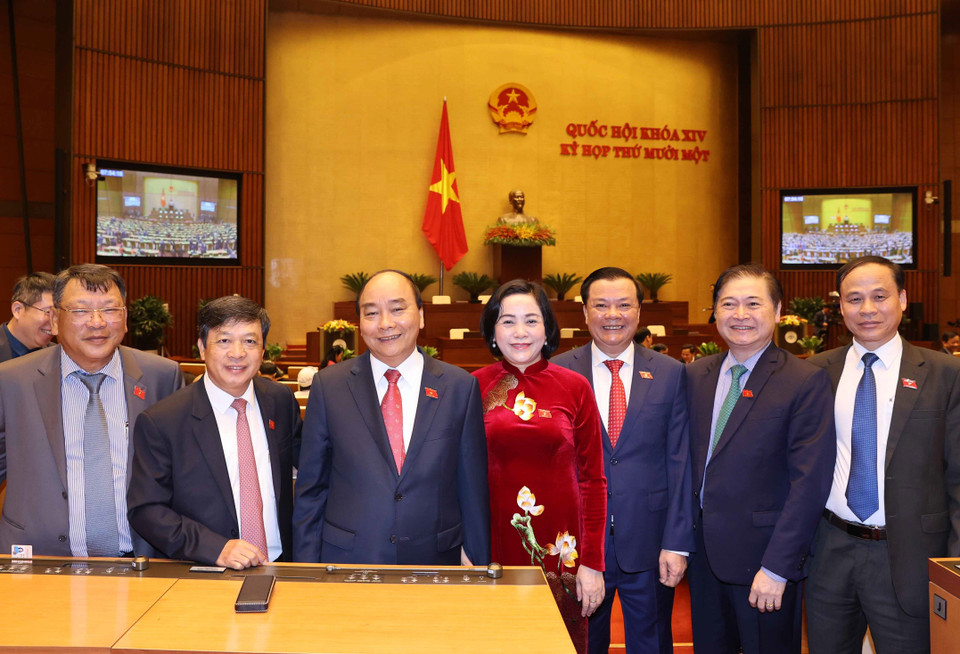 Thủ tướng Nguyễn Xuân Phúc và các đại biểu Quốc hội dự khai mạc kỳ họp lần thứ 11. (Ảnh: Thống Nhất/TTXVN)