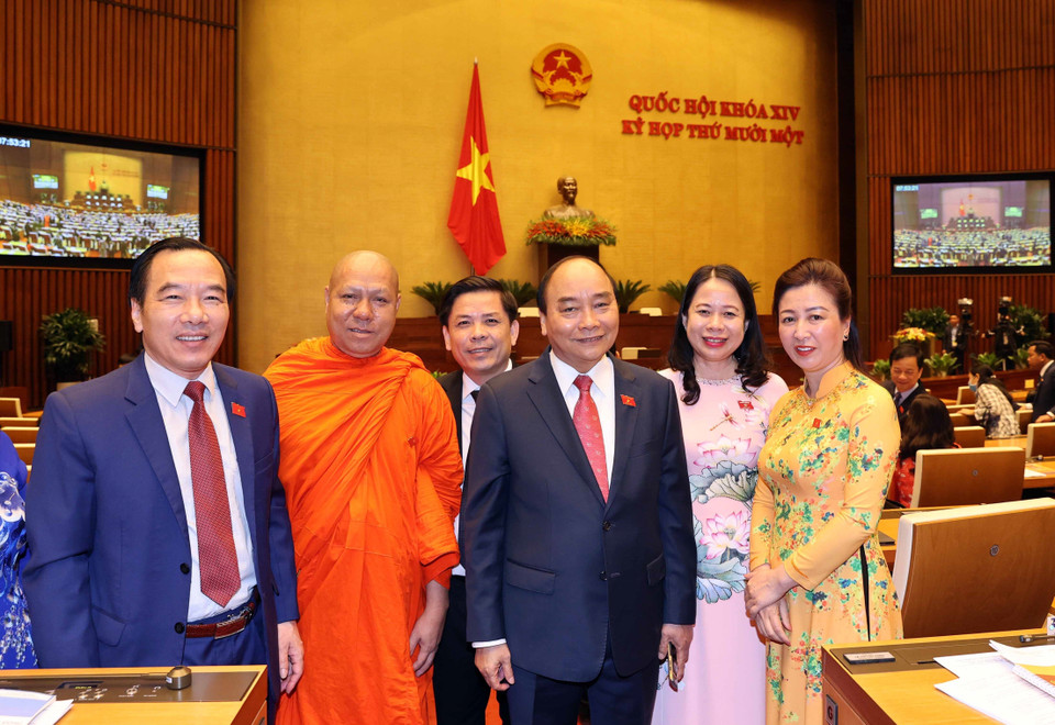 Thủ tướng Nguyễn Xuân Phúc và các đại biểu Quốc hội dự khai mạc kỳ họp lần thứ 11. (Ảnh: Thống Nhất/TTXVN)