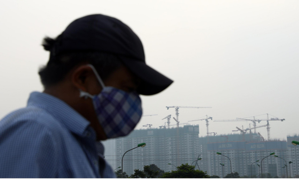 Các công trình xây dựng là một trong 12 nguyên nhân gây ra ô nhiễm. (Ảnh: Huy Hùng/TTXVN)