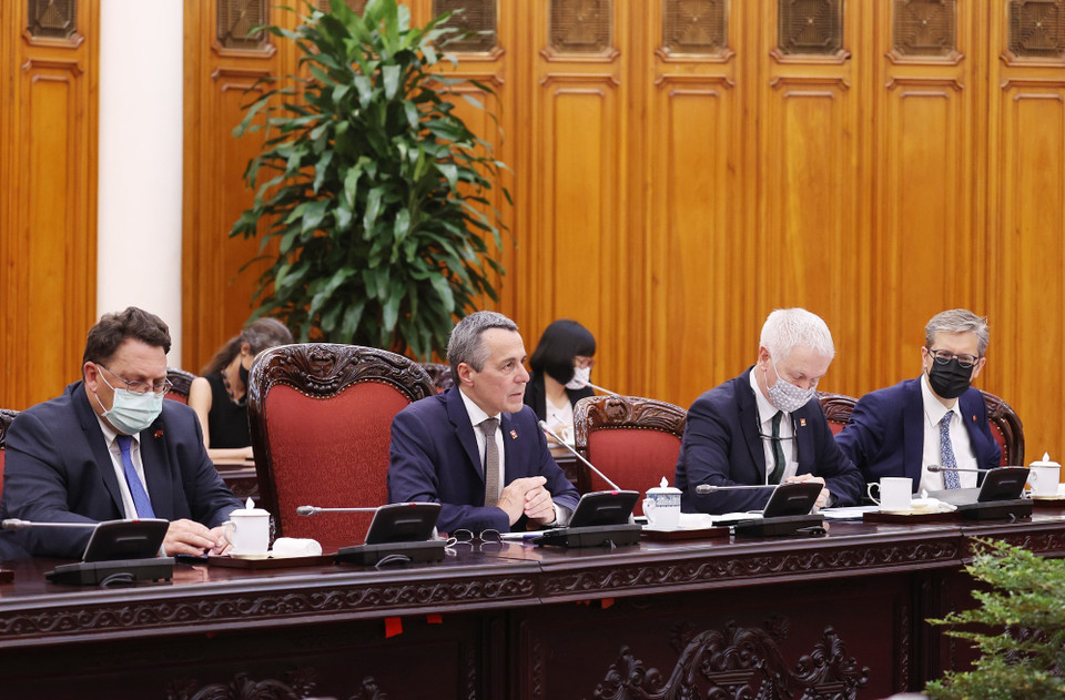 Phó Tổng thống, Bộ trưởng Ngoại giao Liên bang Thụy Sĩ Ignazio Cassis và các thành viên đoàn tham dự buổi tiếp. (Ảnh: Dương Giang/TTXVN)