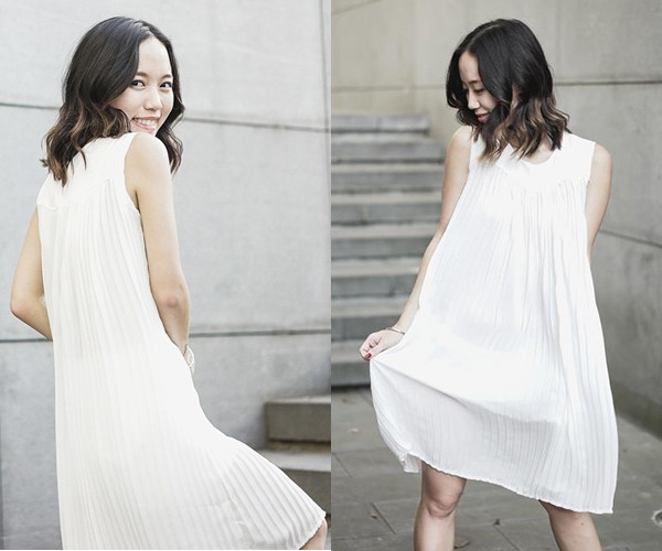 Đôi khi không cần những phụ kiện cầu kỳ cũng làm nên sức hấp dẫn cho một cô gái. Giống như trong ảnh, cô nàng Daul Be vẫn khoe được khía cạnh nữ tính, tự tin dù chỉ diện mẫu váy trắng xếp ly không tay. (Đầm của ULook).