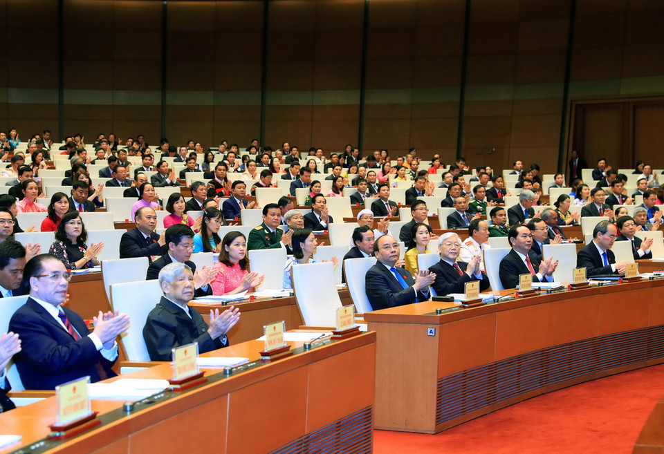 Các đồng chí lãnh đạo, nguyên lãnh đạo Đảng, Nhà nước và các Đại biểu Quốc hội tại lễ khai mạc. (Ảnh: Nhan Sáng/TTXVN)