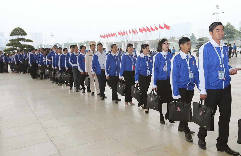 Đại biểu Thanh niên Cộng sản Hồ Chí Minh đến tham dự Đại hội. (Ảnh: TTXVN)