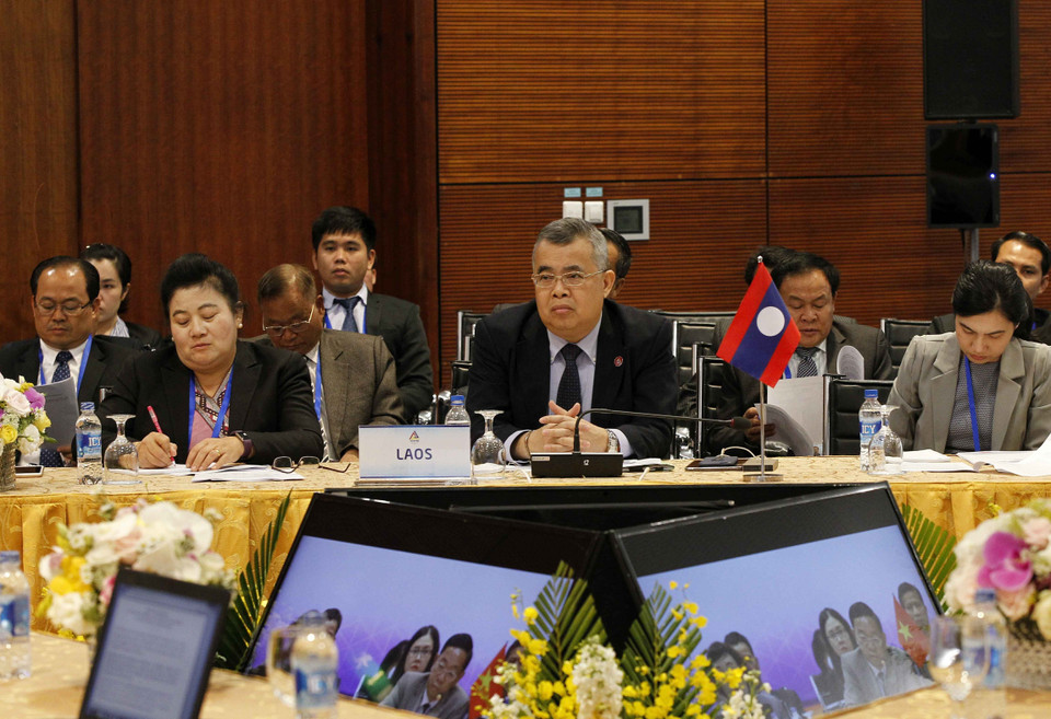 Các đại biểu Đoàn Cộng hòa Dân chủ Nhân dân Lào tại cuộc họp. (Ảnh: TTXVN)