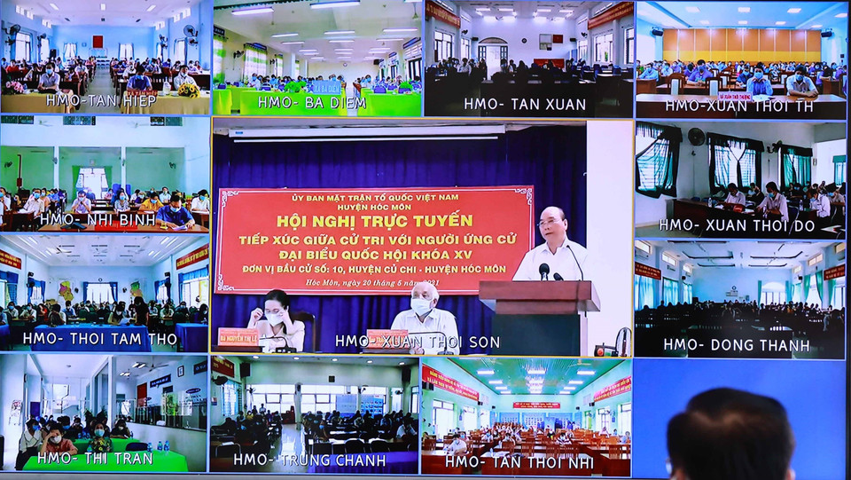 Chủ tịch nước Nguyễn Xuân Phúc trình bày chương trình hành động tại điểm cầu xã Xuân Thới Sơn, huyện Hóc Môn. (Ảnh: Thống Nhất/TTXVN)