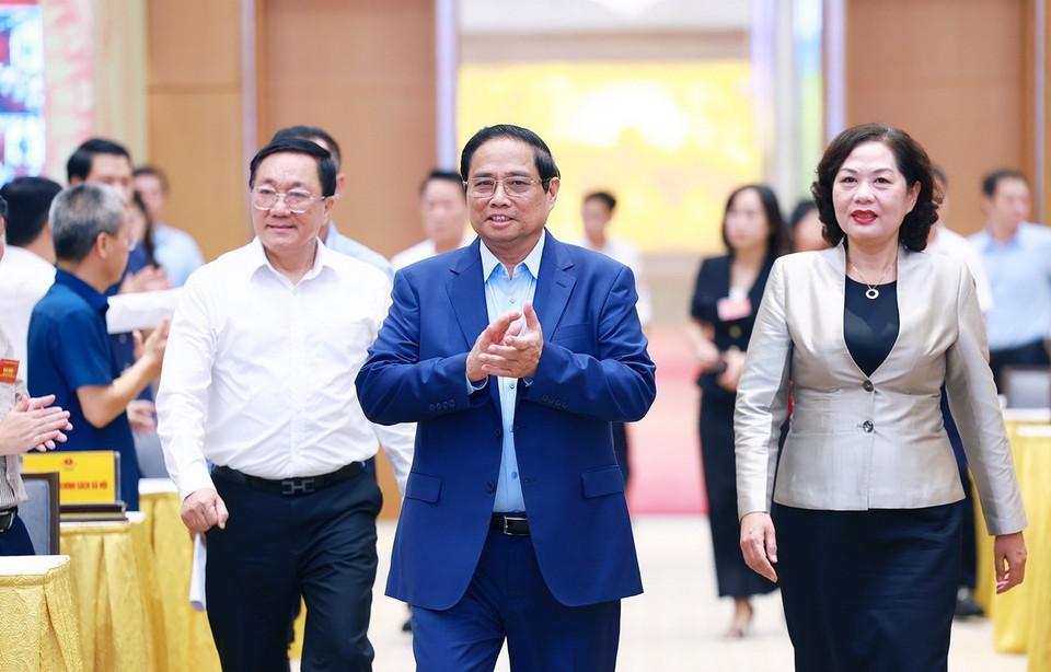 Thủ tướng Phạm Minh Chính đến dự Hội nghị Tổng kết 10 năm thực hiện Chỉ thị số 40-CT/TW ngày 22/11/2014 của Ban Bí thư về tăng cường sự lãnh đạo của Đảng đối với tín dụng chính sách xã hội. (Ảnh: Dương Giang/TTXVN)
