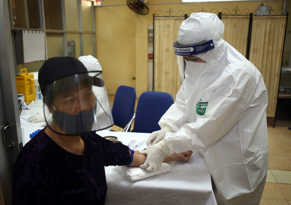 Cuộc xét nghiệm nhằm đánh giá mức độ lây nhiễm trên địa bàn thành phố. (Ảnh: Danh Lam/TTXVN)