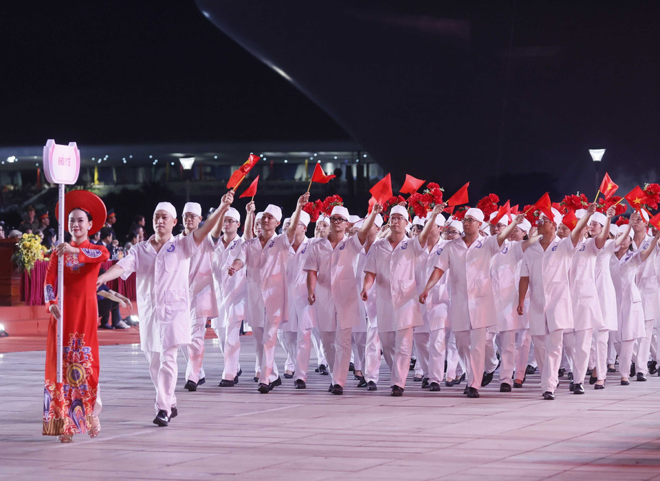 Khối diễu hành tại lễ kỷ niệm. (Ảnh: Thống Nhất/TTXVN)