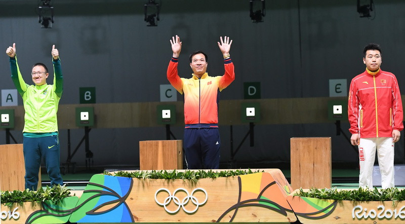 Hoàng Xuân Vinh đã mang về Huy chương vàng đầu tiên cho thể thao Việt Nam tại kỳ Olympic Rio. (Nguồn: AFP/TTXVN)