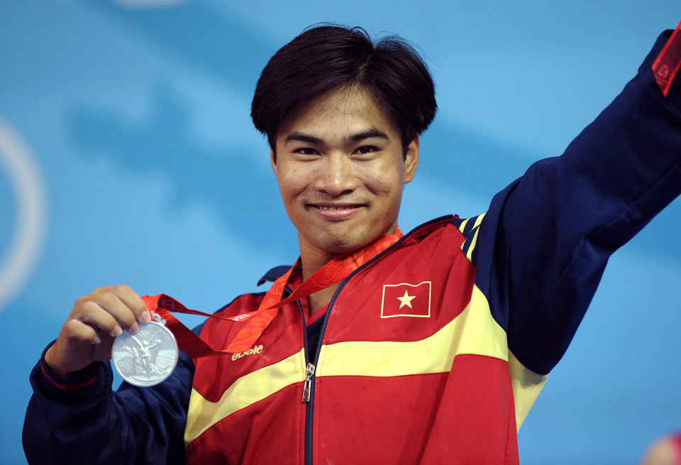 Ngày 10/8/2008: Lực sỹ cử tạ Hoàng Anh Tuấn giành ngôi á quân hạng 56kg nam tại Olympic Bắc Kinh 2008. (Nguồn: TTXVN)
