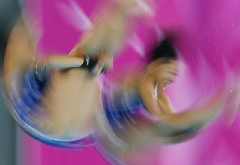 Minami Itahashi (phải) và Fuka Tatsumi của Nhật Bản thi đấu nội dung nhảy cầu 10m phối hợp nữ tại Thế vận hội châu Á lần thứ 17 vào ngày 30 tháng 9.