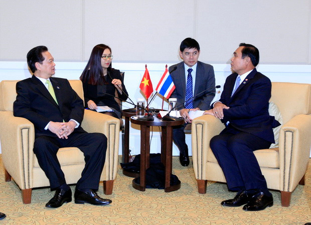 Thủ tướng Nguyễn Tấn Dũng hội kiến với Thủ tướng Thái Lan Prayuth Chan-ocha. (Ảnh: Đức Tám/TTXVN)