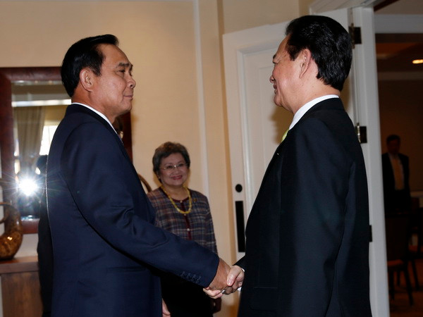 Thủ tướng Nguyễn Tấn Dũng hội kiến với Thủ tướng Thái Lan Prayuth Chan-ocha. (Ảnh: Đức Tám/TTXVN)