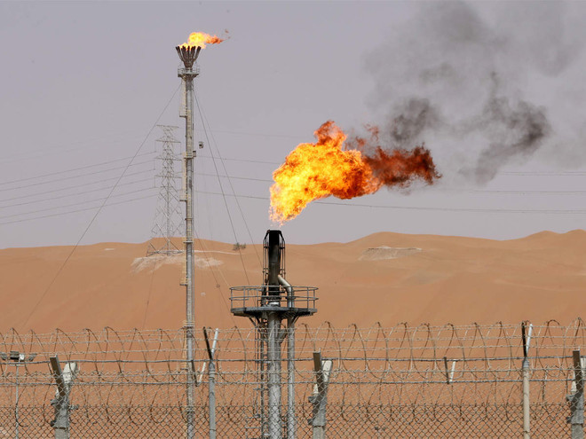 Giá dầu và giá vàng châu Á đồng loạt giảm trong phiên sáng 23/3 ảnh 1