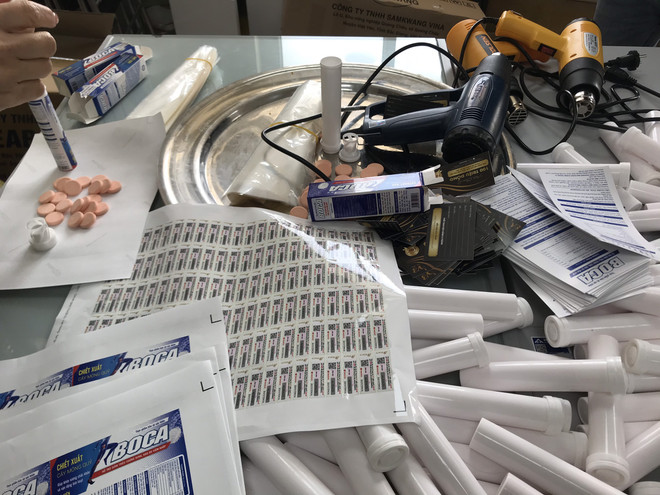 Hà Nội triệt phá đường dây sản xuất, buôn bán hàng giả quy mô lớn ảnh 2