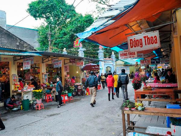 Tiền lẻ đã dần vắng bóng tại đền, chùa trong dịp đầu Xuân ảnh 2