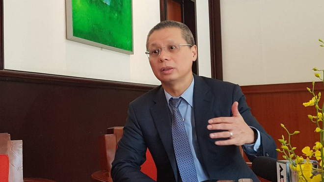 Tổng Giám đốc Techcombank Nguyễn Lê Quốc Anh trong một cuộc trả lời phỏng vấn báo chí. (Ảnh: T.H/Vietnam+) Tổng Giám đốc Ngân hàng Techcombank sẽ thôi việc từ tháng Chín ảnh 1