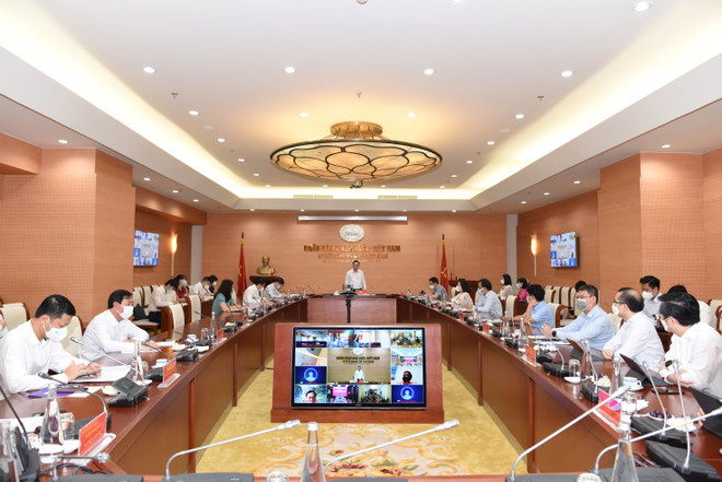 Các đại biểu tham dự tại Hội nghị trực tuyến. (Ảnh: Vietnam+) Ngân hàng 'xắn tay' tháo gỡ khó khăn cho lúa gạo khu vực ĐBSCL ảnh 1